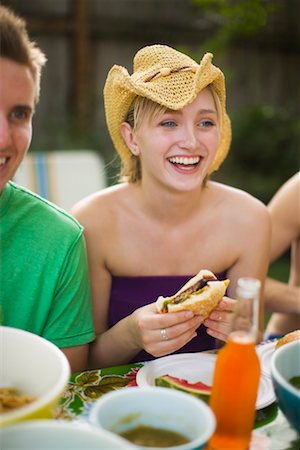 person eating a hamburger - Friends at Backyard Barbeque, Portland, Oregon, USA Stock Photo - Premium Royalty-Free, Code: 600-02263945
