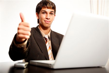 Businessman Using Laptop Computer Foto de stock - Sin royalties Premium, Código: 600-02289247