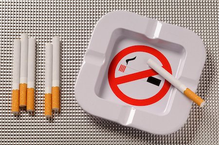 smoking prohibited sign symbol image - Cigarettes and Ashtray Stock Photo - Premium Royalty-Free, Code: 600-02290150