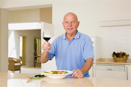 simsearch:600-02257926,k - Portrait of Man Raising Glass of Wine Photographie de stock - Premium Libres de Droits, Code: 600-02290182