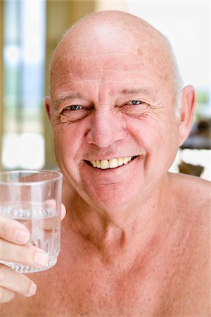 simsearch:600-02257926,k - Portrait of Man Drinking Glass of Water Photographie de stock - Premium Libres de Droits, Code: 600-02290227