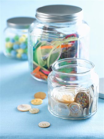 Jars of Buttons, Ribbon and Pom Poms Stock Photo - Premium Royalty-Free, Code: 600-02312347