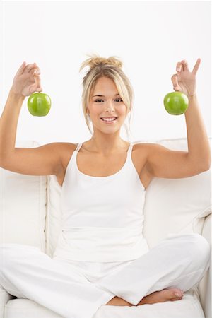 people with fruits cutout - Portrait of Young Woman Holding Apples Stock Photo - Premium Royalty-Free, Code: 600-02312473