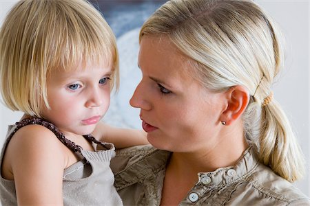 sad child hug mother - Portrait of Mother and Daughter Stock Photo - Premium Royalty-Free, Code: 600-02332650