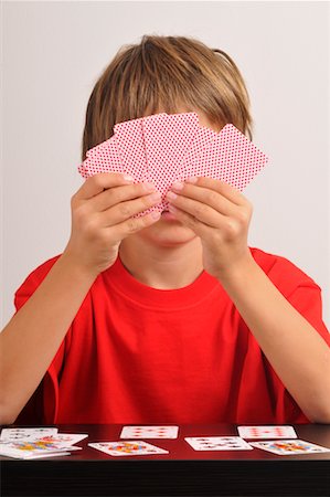 playing card (deck of cards) - Boy with Playing Cards Stock Photo - Premium Royalty-Free, Code: 600-02346197