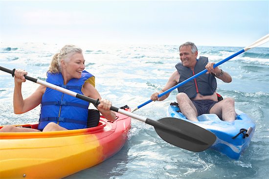 Woman and Man Kayaking Stock Photo - Premium Royalty-Free, Artist: Jerzyworks, Image code: 600-02346295