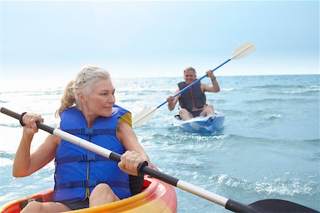 fair haired mature male boat - Woman and Man Kayaking Stock Photo - Premium Royalty-Free, Code: 600-02346293