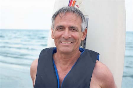 simsearch:600-02264322,k - Portrait of Man with Windsurfer Stock Photo - Premium Royalty-Free, Code: 600-02346308