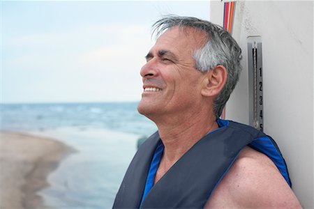 simsearch:600-02264322,k - Portrait of Man with Windsurfer Stock Photo - Premium Royalty-Free, Code: 600-02346309