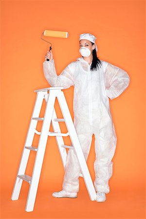 pintor - Woman Painting with Roller Foto de stock - Sin royalties Premium, Código: 600-02346325