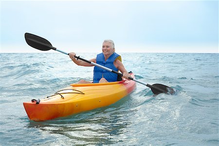 Woman Kayaking, Elmvale, Ontario, Canada Stock Photo - Premium Royalty-Free, Code: 600-02346543