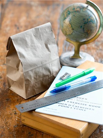 simsearch:700-02121508,k - School Supplies, Lunch Bag and Globe on Desk Stock Photo - Premium Royalty-Free, Code: 600-02348718