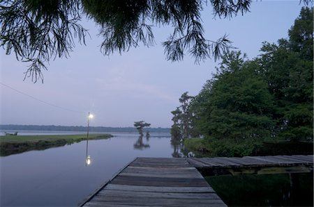 Dock by Lake, Lake Martin, Lafayette, Louisiana, USA Foto de stock - Sin royalties Premium, Código: 600-02377286
