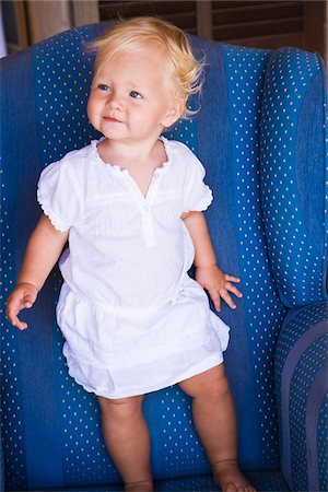 simsearch:600-00795637,k - Toddler Standing on Armchair Photographie de stock - Premium Libres de Droits, Code: 600-02371047