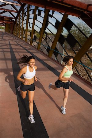 runner bridge - Two Women Running Across a Pedestrian Bridge, Tucson, Arizona, USA Stock Photo - Premium Royalty-Free, Code: 600-02385961