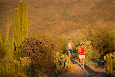 running athletic ty milford - Women Running on Desert Trail, Saguaro National Park, Arizona, USA Stock Photo - Premium Royalty-Free, Code: 600-02385975