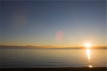 sunset west coast blue sky - Sunrise over Lake Tahoe, California, USA Stock Photo - Premium Royalty-Free, Code: 600-02386151