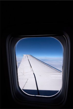 simsearch:600-03484708,k - View of Wing from Airplane Window Stock Photo - Premium Royalty-Free, Code: 600-02428490