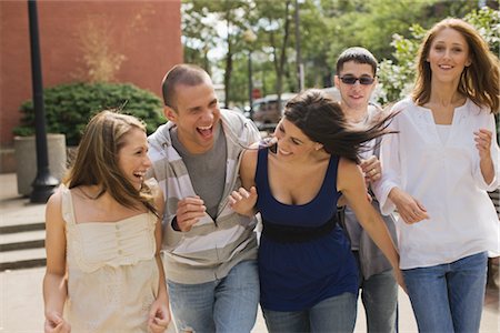 student walking not backpack not elementary not campus not indoors - Friends Laughing Together Stock Photo - Premium Royalty-Free, Code: 600-02428842