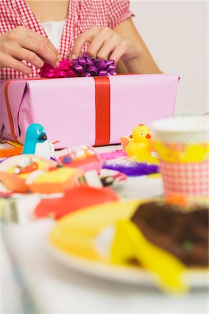 simsearch:600-02461295,k - Woman Opening Birthday Present at Party Stock Photo - Premium Royalty-Free, Code: 600-02461296