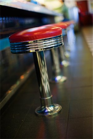 diner bar stool - Close-up of Stools in Retro Diner Stock Photo - Premium Royalty-Free, Code: 600-02586048