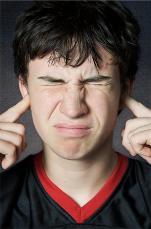 plugging ears - Boy Plugging Ears Stock Photo - Premium Royalty-Free, Code: 600-02586223