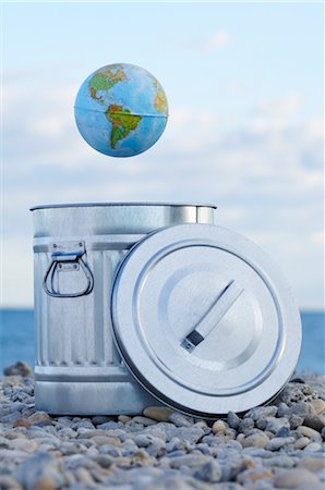 Earth above Garbage Can Stock Photo - Premium Royalty-Free, Code: 600-02594036