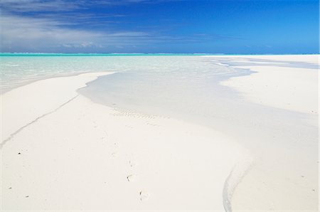 Empreintes dans le sable sur la plage, île de la lune de miel, Aitutaki Lagoon, Aitutaki, îles Cook Photographie de stock - Premium Libres de Droits, Code: 600-02590624