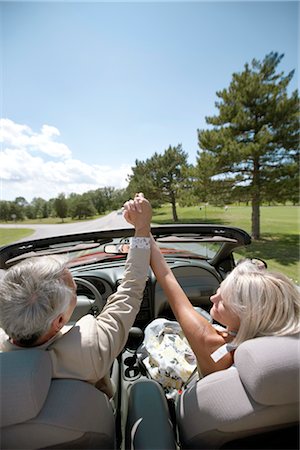 Excited Couple in Convertible Stock Photo - Premium Royalty-Free, Code: 600-02593746