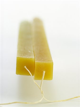 Two Square Candles Foto de stock - Sin royalties Premium, Código: 600-02637134