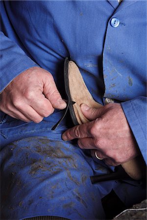 Italian Shoemaker Cutting Edge of Sole on Boot Stock Photo - Premium Royalty-Free, Code: 600-02669666