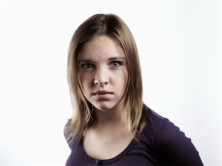 defiant - Portrait of Teenaged Girl Foto de stock - Sin royalties Premium, Código: 600-02670093