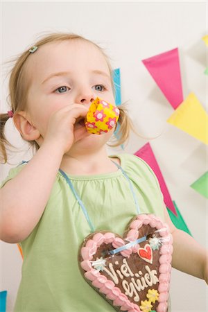 simsearch:600-02660154,k - Girl at Birthday Party Stock Photo - Premium Royalty-Free, Code: 600-02670235