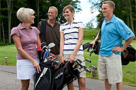 smiling senior people talking family - Couples at Golf Course, Burlington, Ontario, Canada Stock Photo - Premium Royalty-Free, Code: 600-02670410
