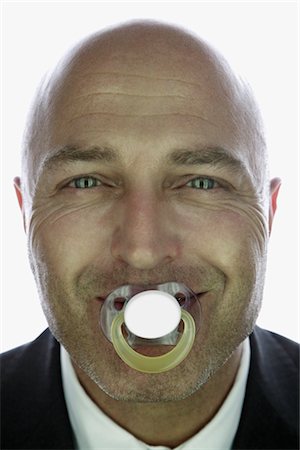 Portrait of Man with Pacifier Stock Photo - Premium Royalty-Free, Code: 600-02670670