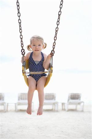 simsearch:600-02671009,k - Girl Wearing Bathing Suit in Swing on Beach, Cancun, Mexico Stock Photo - Premium Royalty-Free, Code: 600-02686150