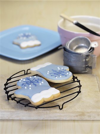 decorated cookies - Christmas Cookies on Baking Table Stock Photo - Premium Royalty-Free, Code: 600-02686560