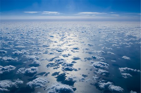 simsearch:600-08312113,k - Aerial View of Clouds and Blue Sky Over Pacific Ocean Stock Photo - Premium Royalty-Free, Code: 600-02694417