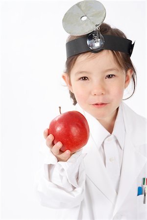 play with fruit - Girl Dressed as Doctor Stock Photo - Premium Royalty-Free, Code: 600-02693633