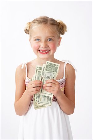 Girl with Money Stock Photo - Premium Royalty-Free, Code: 600-02693695