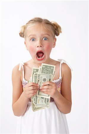 Girl with Money Stock Photo - Premium Royalty-Free, Code: 600-02693696
