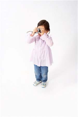 Girl Taking Picture Foto de stock - Sin royalties Premium, Código: 600-02693713