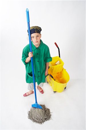 frustrated child white background - Little Girl Dressed Up as Janitor Stock Photo - Premium Royalty-Free, Code: 600-02693742