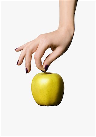 Woman's Hand Holding Apple Foto de stock - Sin royalties Premium, Código: 600-02693871