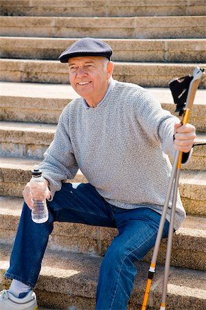 simsearch:600-01764446,k - Nordic Walker Taking a Break and Drinking Bottled Water Stock Photo - Premium Royalty-Free, Code: 600-02693883