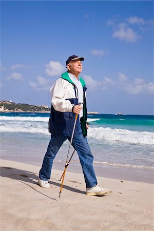 simsearch:600-02290085,k - Man Nordic Walking on the Beach Photographie de stock - Premium Libres de Droits, Code: 600-02693892