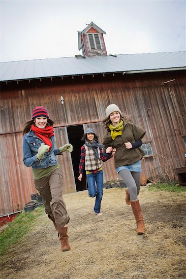Three Teenage Girls Running on a Farm in Hillsboro, Oregon, USA Stock Photo - Premium Royalty-Free, Artist: Ty Milford, Image code: 600-02700693