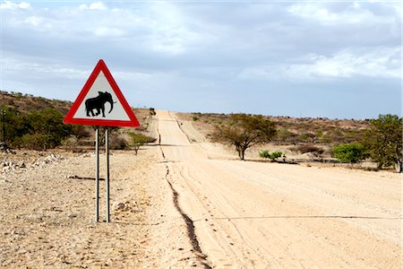 symbol cautious - Elephant Crossing Sign by Road, Damaraland, Namibia Stock Photo - Premium Royalty-Free, Code: 600-02700933