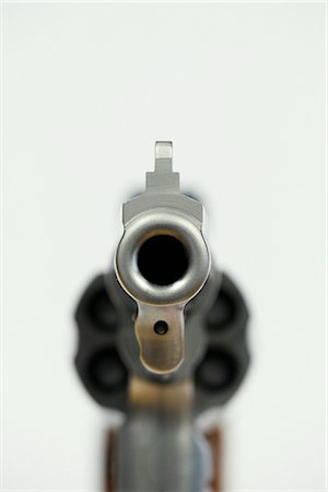 Close-up of Gun Barrel of Smith and Wesson Revolver Stock Photo - Premium Royalty-Free, Code: 600-02701076