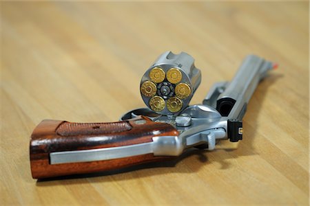 Close-up of Smith and Wesson Revolver Stock Photo - Premium Royalty-Free, Code: 600-02701077